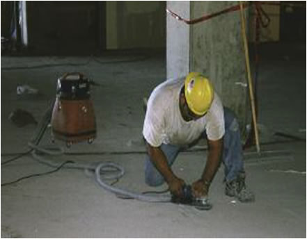 worker grinding without dust around him